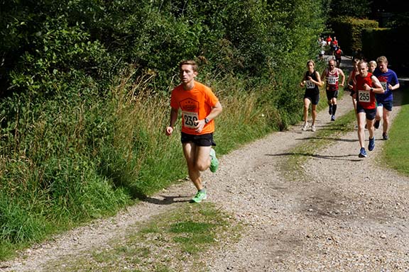 runners pushing through difficult trail