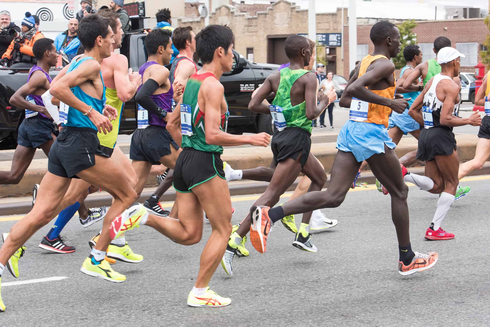 Men Running in Various Shorts